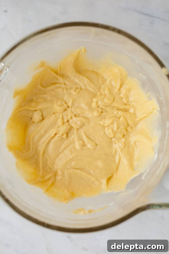 Espresso-Spiked Chai Coffee Cake 11 A large glass bowl with coffee cake batter