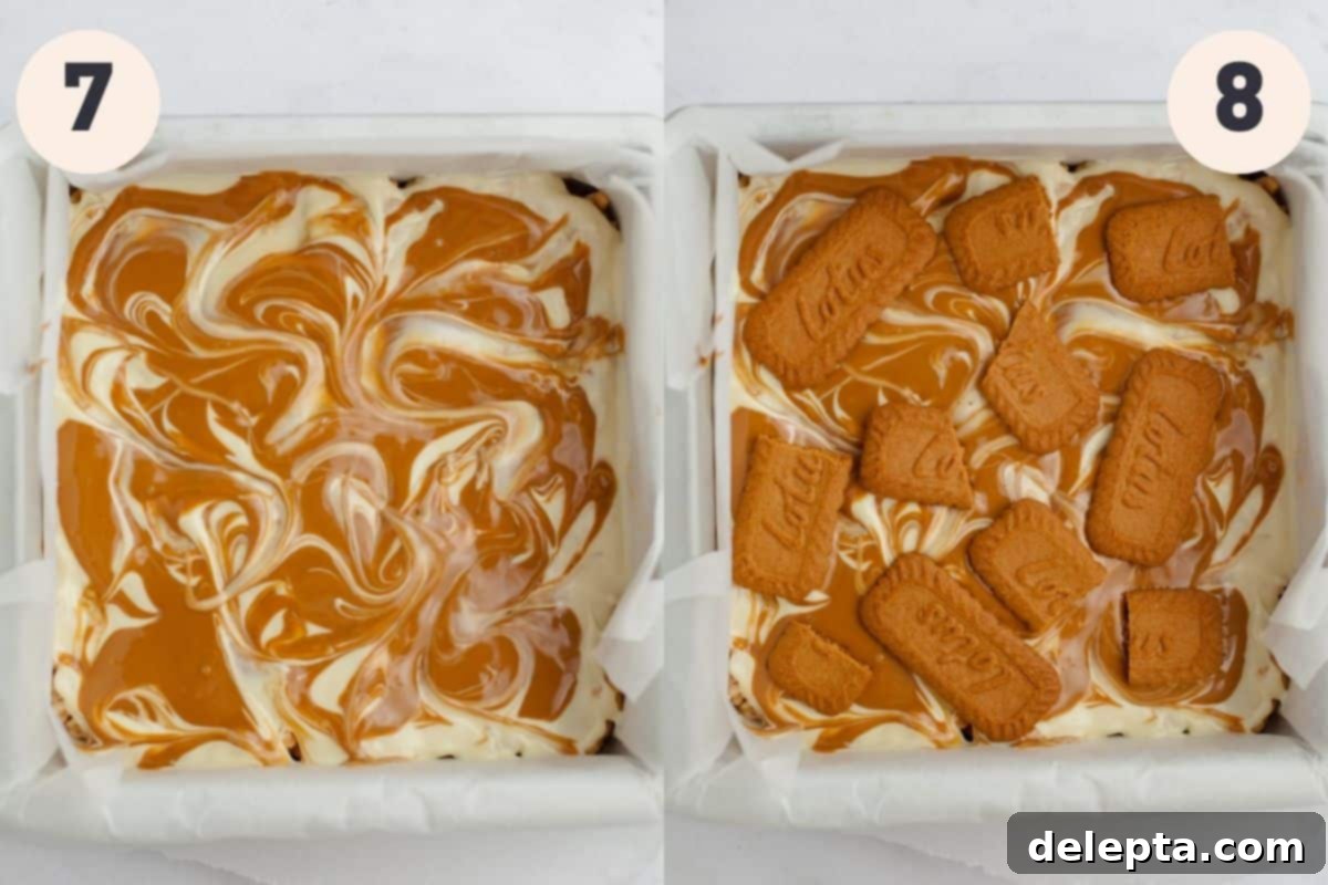 Ultimate Biscoff Krispie Bars 7 Melted white chocolate and Biscoff spread artfully swirled together on top of rice krispie treats, with crushed Speculoos cookies.