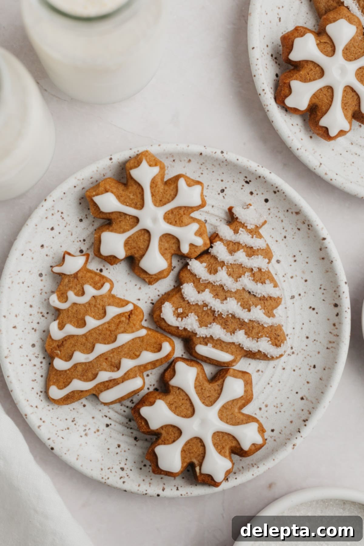 Bright Gingerbread Cookies 2 Beautifully iced gingerbread cookies arranged on a festive plate, ready for the holidays.