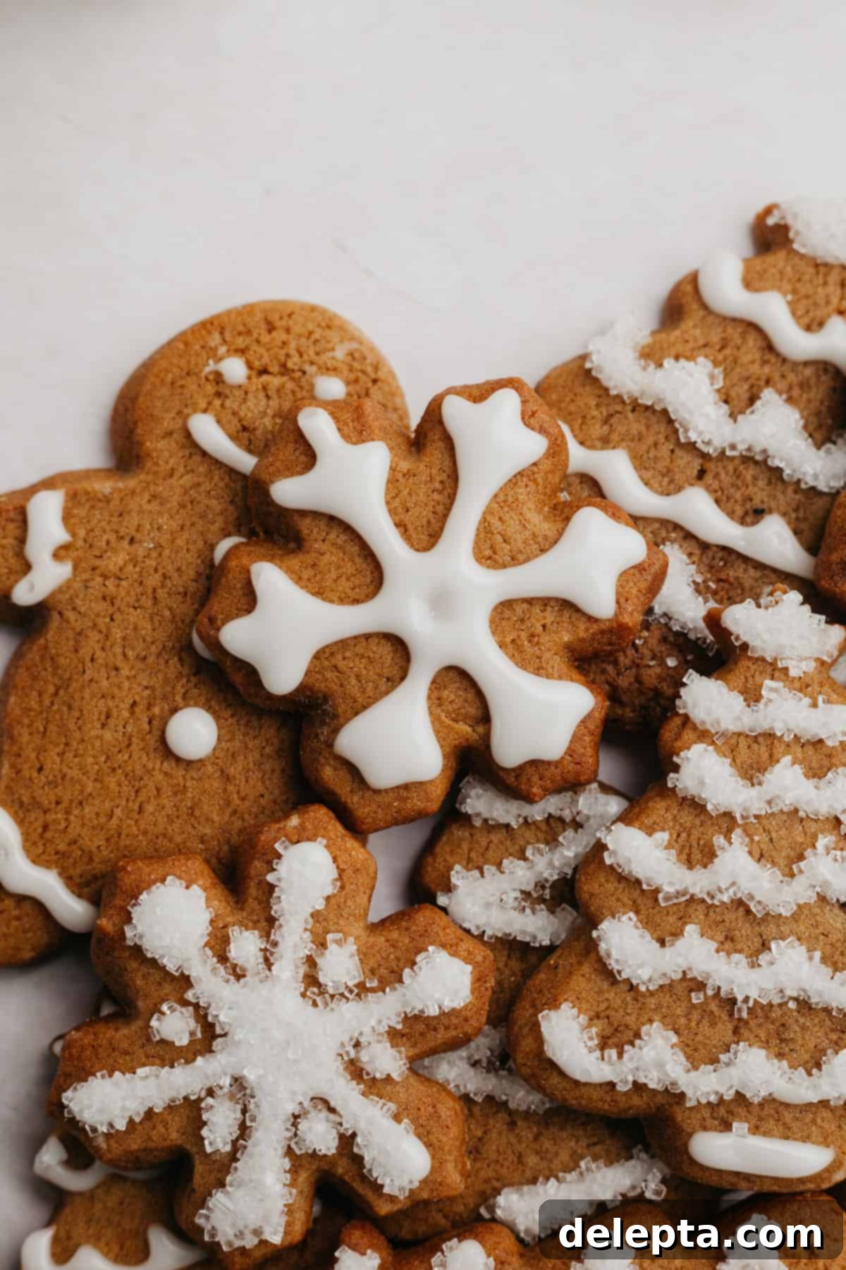 Bright Gingerbread Cookies 6 Close-up of intricately iced gingerbread cookies, showcasing festive holiday decorations.