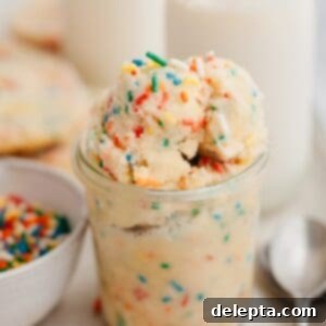 No-Bake Sugar Cookie Dough 7 Sugar cookie dough in a glass jar.
