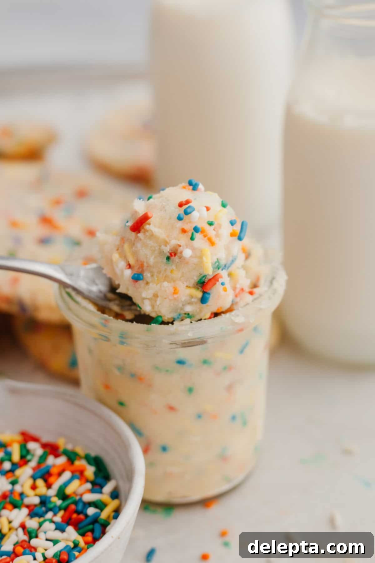 No-Bake Sugar Cookie Dough 6 Sugar cookie dough in a glass jar, ready to be enjoyed.