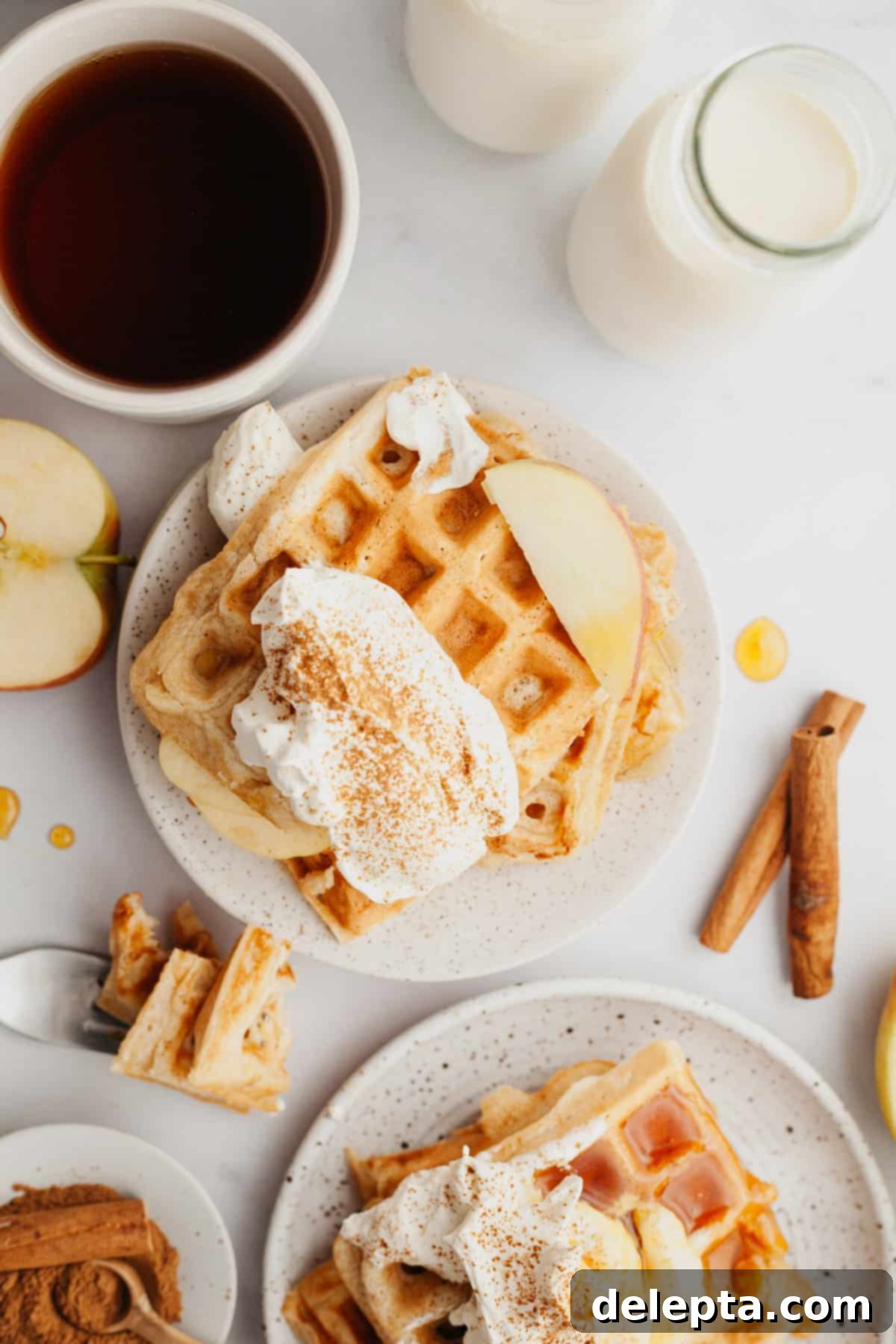Apple Pie Waffles 6 A beautifully cooked apple waffle, golden brown and crisp, ready to be enjoyed.