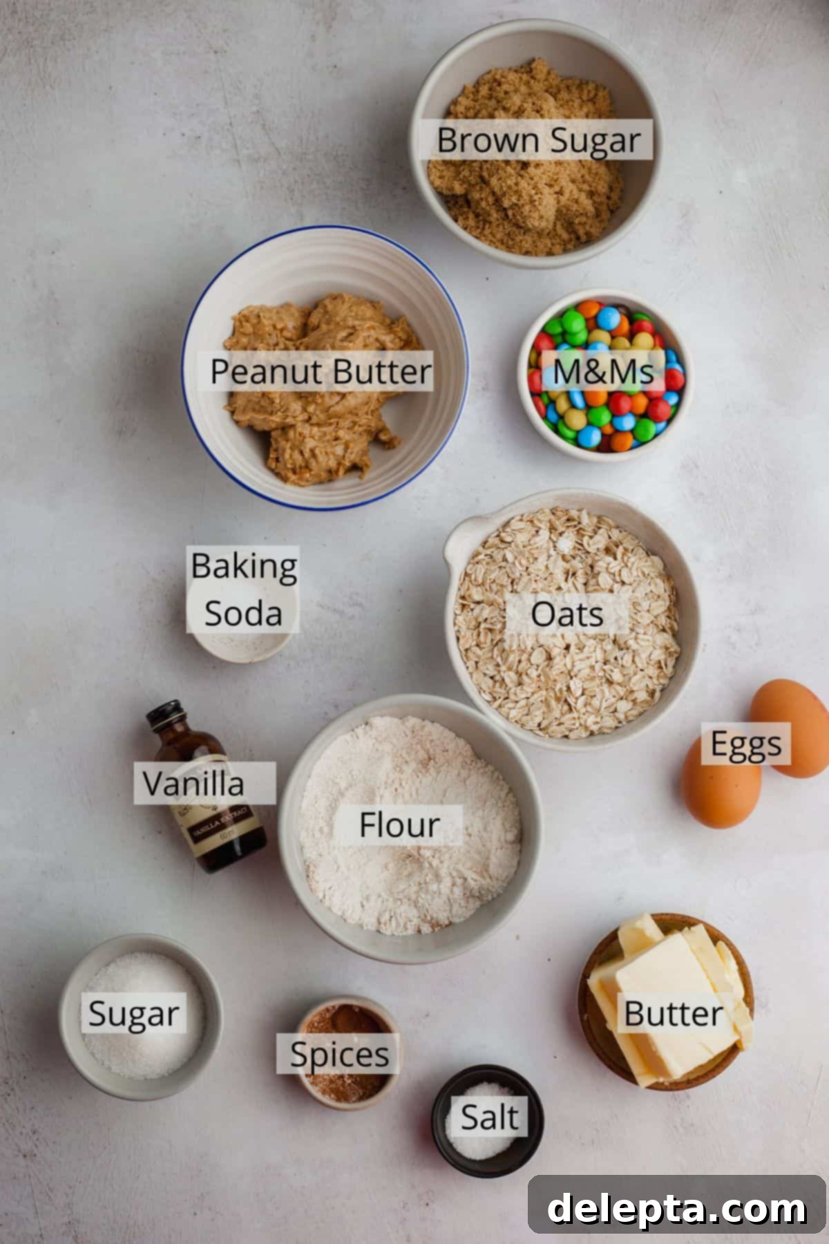 M and M Loaded Peanut Butter Oatmeal Cookies 3 All the necessary ingredients for baking oatmeal peanut butter M&M cookies, neatly weighed out in small bowls.