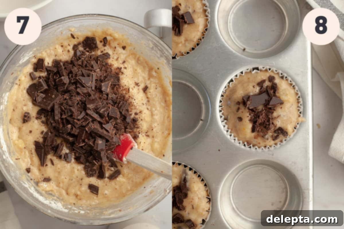 Gourmet Chocolate Chunk Banana Muffins 8 A bowl of banana muffin batter with generous chopped chocolate pieces, alongside an unbaked muffin pan with filled liners and chocolate sprinkled on top.