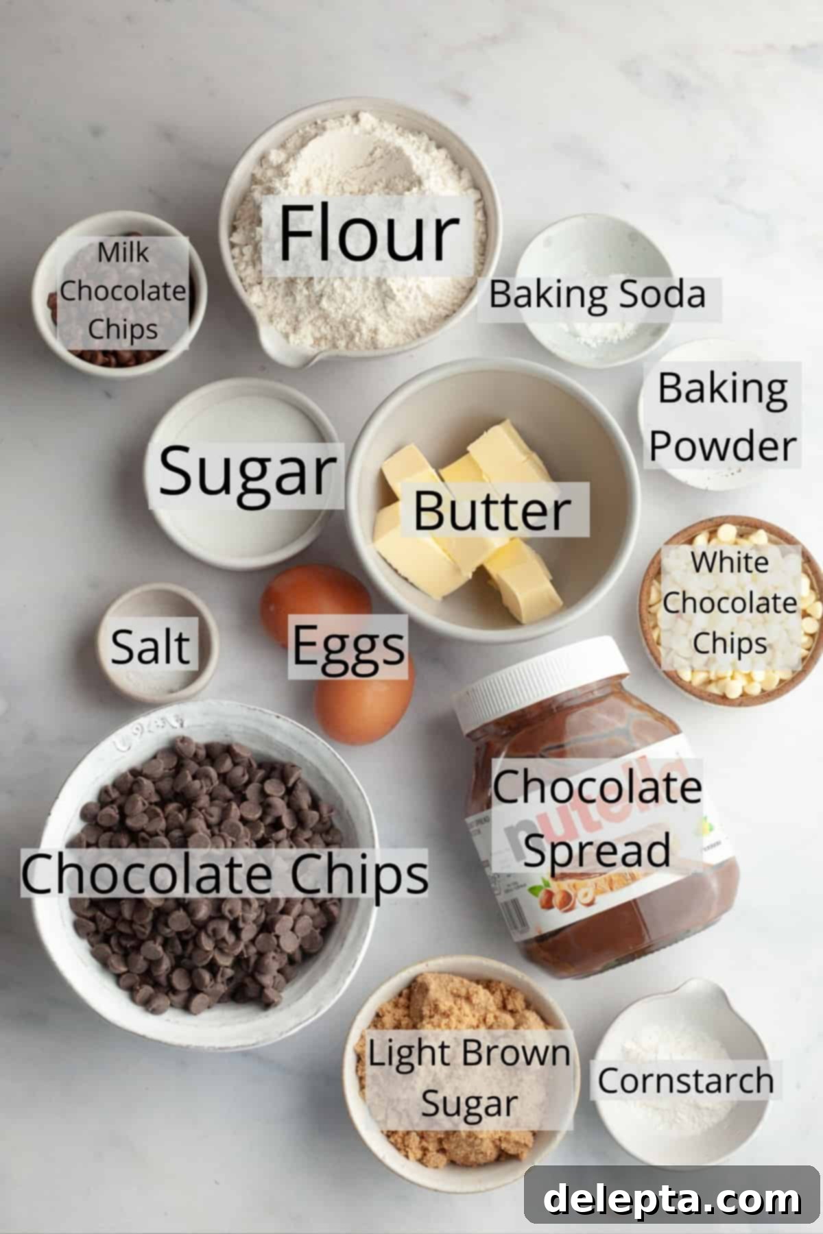 Ultimate Thick and Gooey Chocolate Lava Cookies 3 All the essential ingredients meticulously weighed out into small bowls, ready to create delicious chocolate filled cookies.