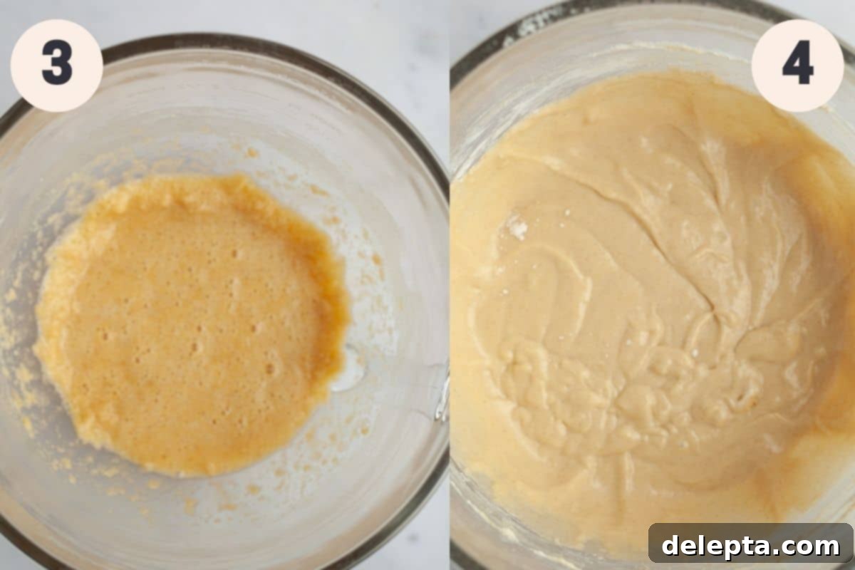 Heavenly Pecan Sour Cream Coffee Cake 6 A large glass mixing bowl with coffee cake batter in it, showcasing the smooth, creamy consistency after mixing.