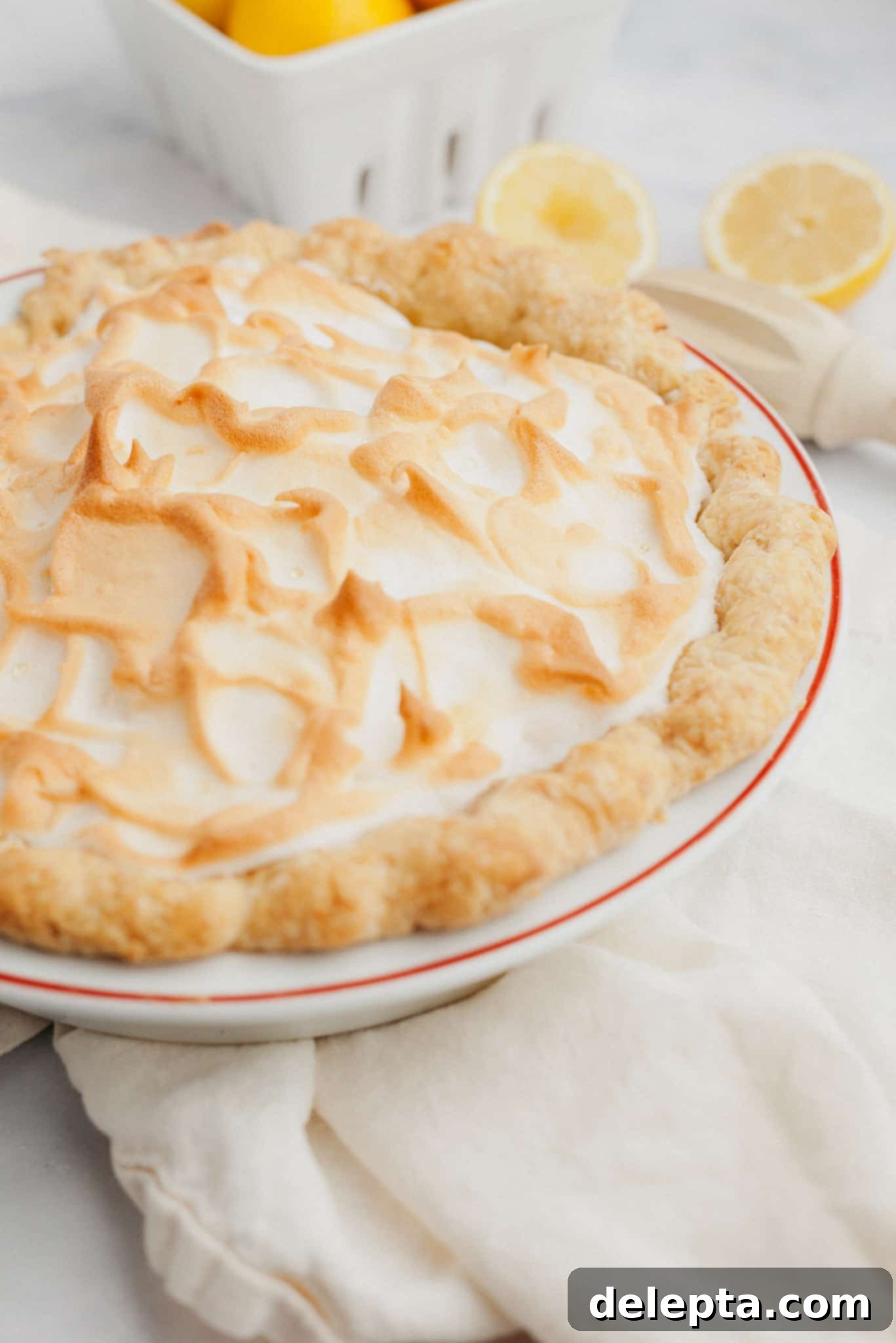 Lemon Cloud Dream 11 A perfectly toasted homemade lemon meringue pie, with peaks of golden brown meringue.