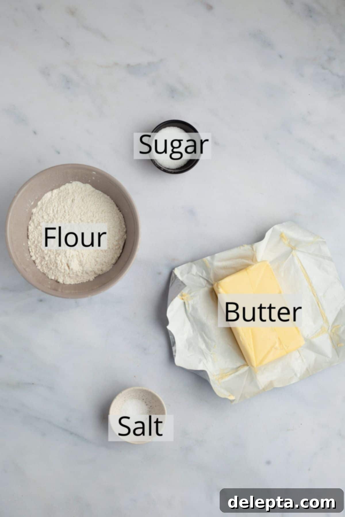 Lemon Cloud Dream 3 All the ingredients for homemade pie dough laid out on a surface.