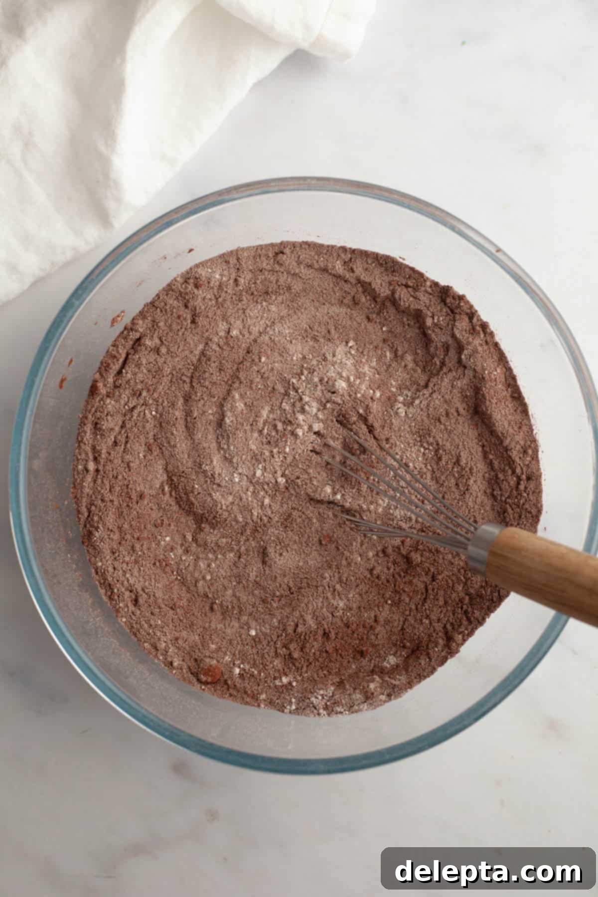 Matilda's 20 Minute Chocolate Cake 4 Cocoa powder and flour mixed together in a bowl.