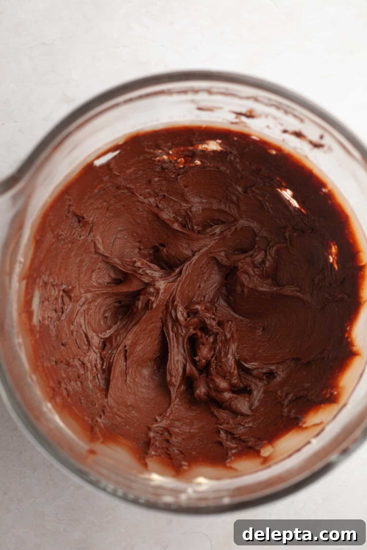 Matilda's 20 Minute Chocolate Cake 9 Frosting frosting in a large glass bowl.