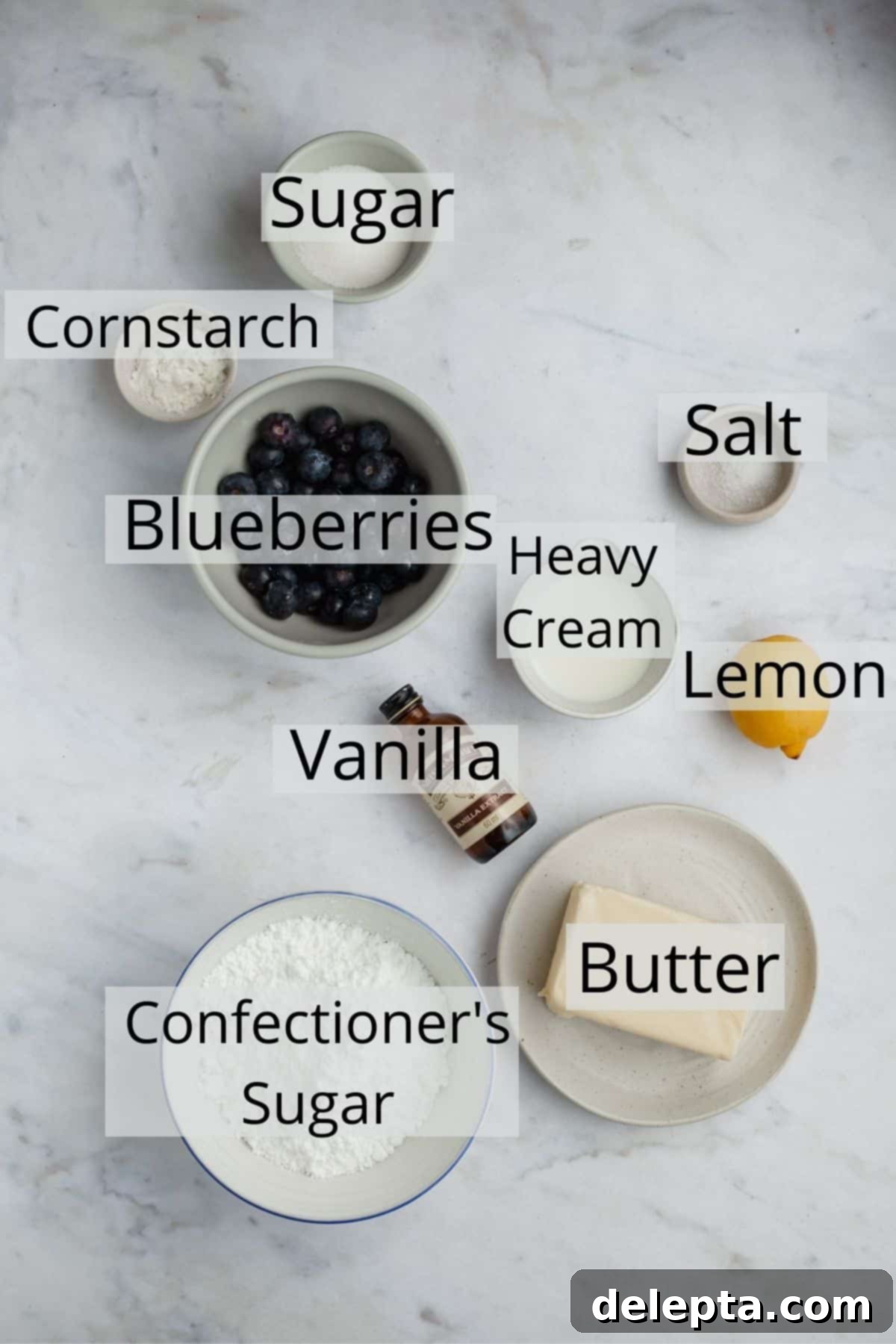 Zesty Lemon Blueberry Layer Cake 4 Ingredients for the homemade blueberry filling and the creamy lemon buttercream, measured and ready.