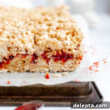 Peanut Butter Jelly Krispie Squares 6 side view of peanut butter and jelly rice krispie treats