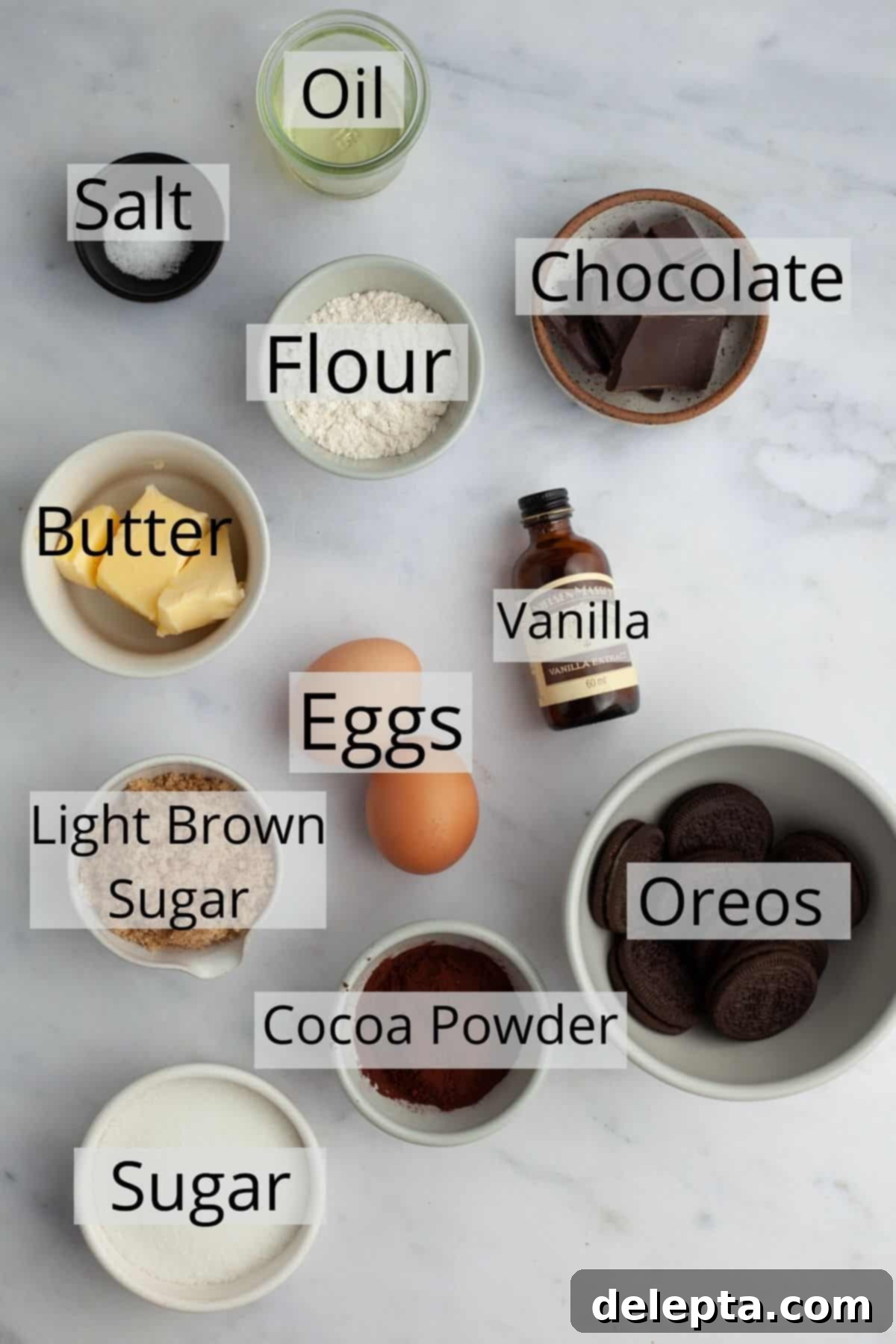 Ultimate Oreo Brookies 3 All the ingredients for Oreo brownies weighed out into small bowls, ready for mixing.