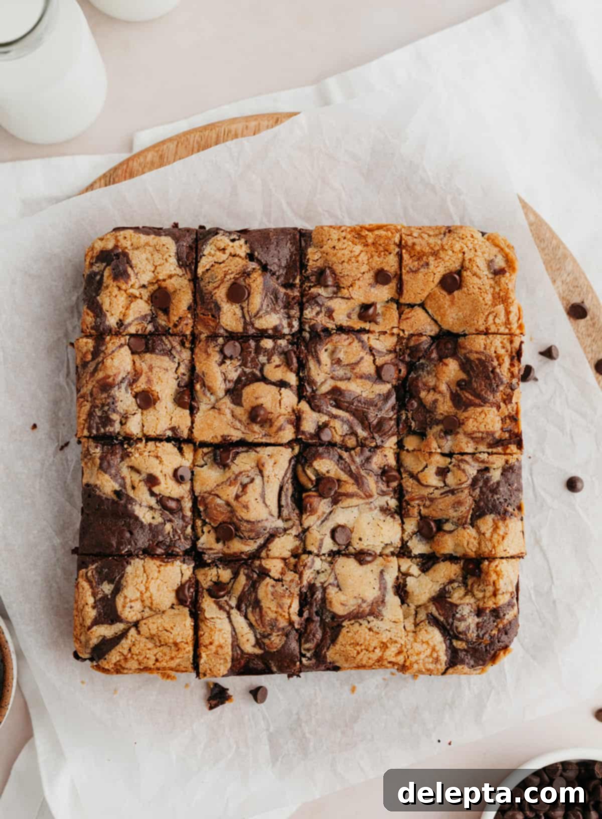 Ultimate Oreo Brookies 10 Oreo brookies on parchment paper sliced into perfect squares, ready to be enjoyed.