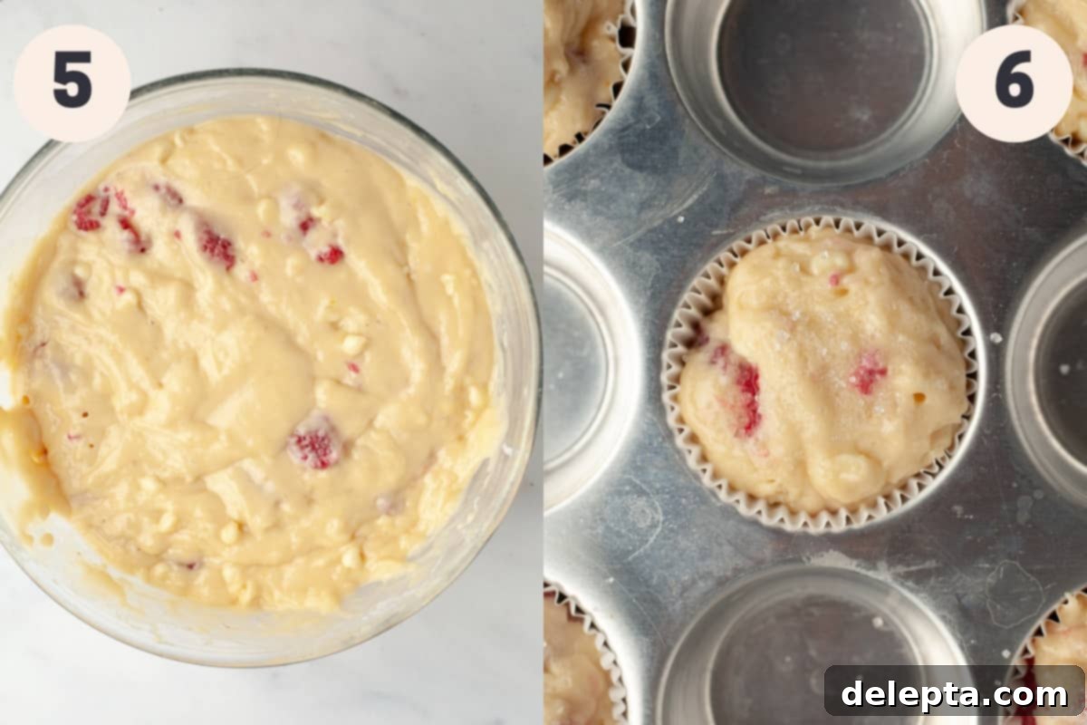Decadent Raspberry White Chocolate Muffins 6 A glass bowl with raspberry muffin batter and a muffin pan with unbaked muffins, ready for the oven.
