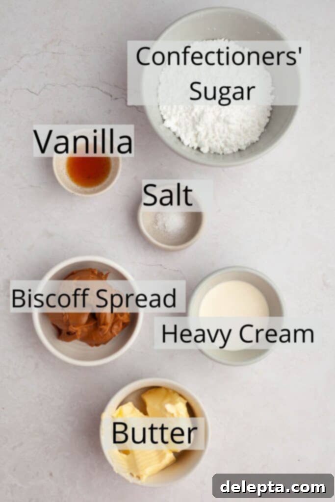 Effortless Lotus Biscoff Cake 4 All the ingredients to make Biscoff buttercream weighed out into small bowls.