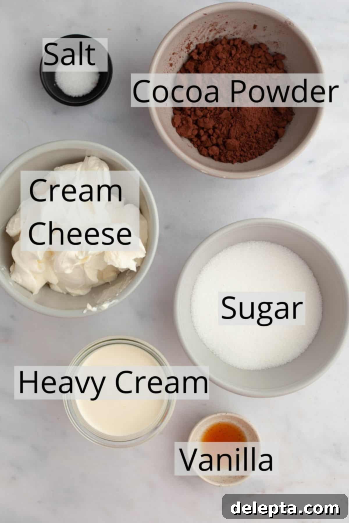 Velvet Chocolate Cream Cheese Delight 4 All the ingredients needed to make the light and fluffy chocolate cream cheese frosting weighed out into small bowls.