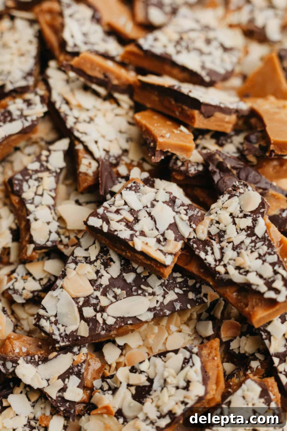Sweet Almond Buttercrunch 6 Irregularly shaped pieces of almond toffee bark, ready to be enjoyed or gifted.