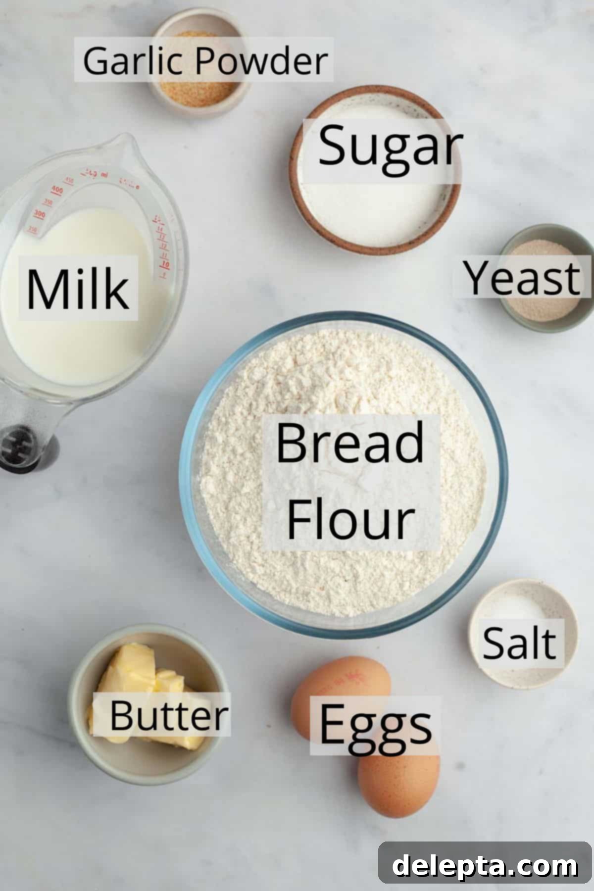 Soft Brioche Dinner Rolls 3 Ingredients for brioche dinner rolls, including flour, milk, butter, and eggs.
