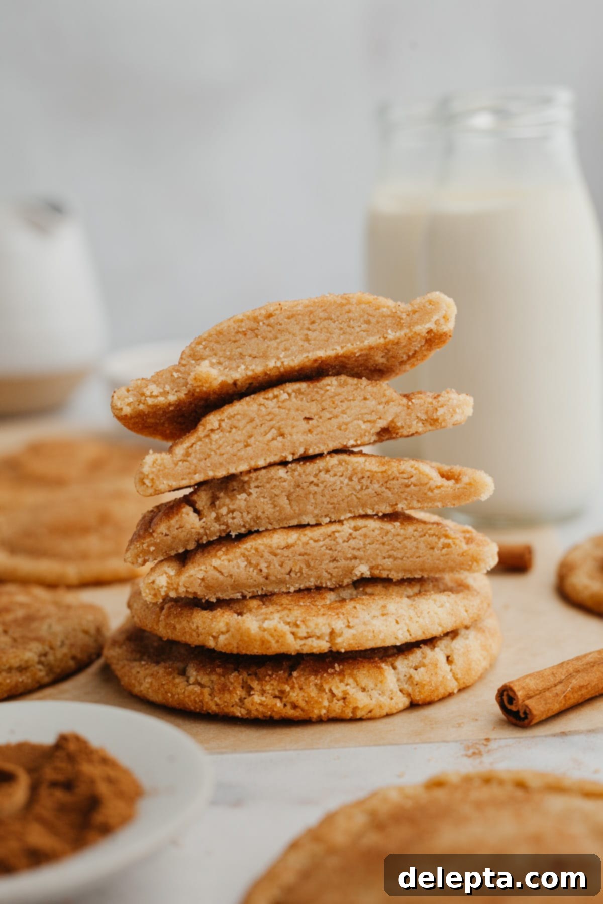 Nutty Brown Butter Snickerdoodles 8 A stack of perfectly baked snickerdoodle cookies, showing their soft texture and cinnamon sugar coating.
