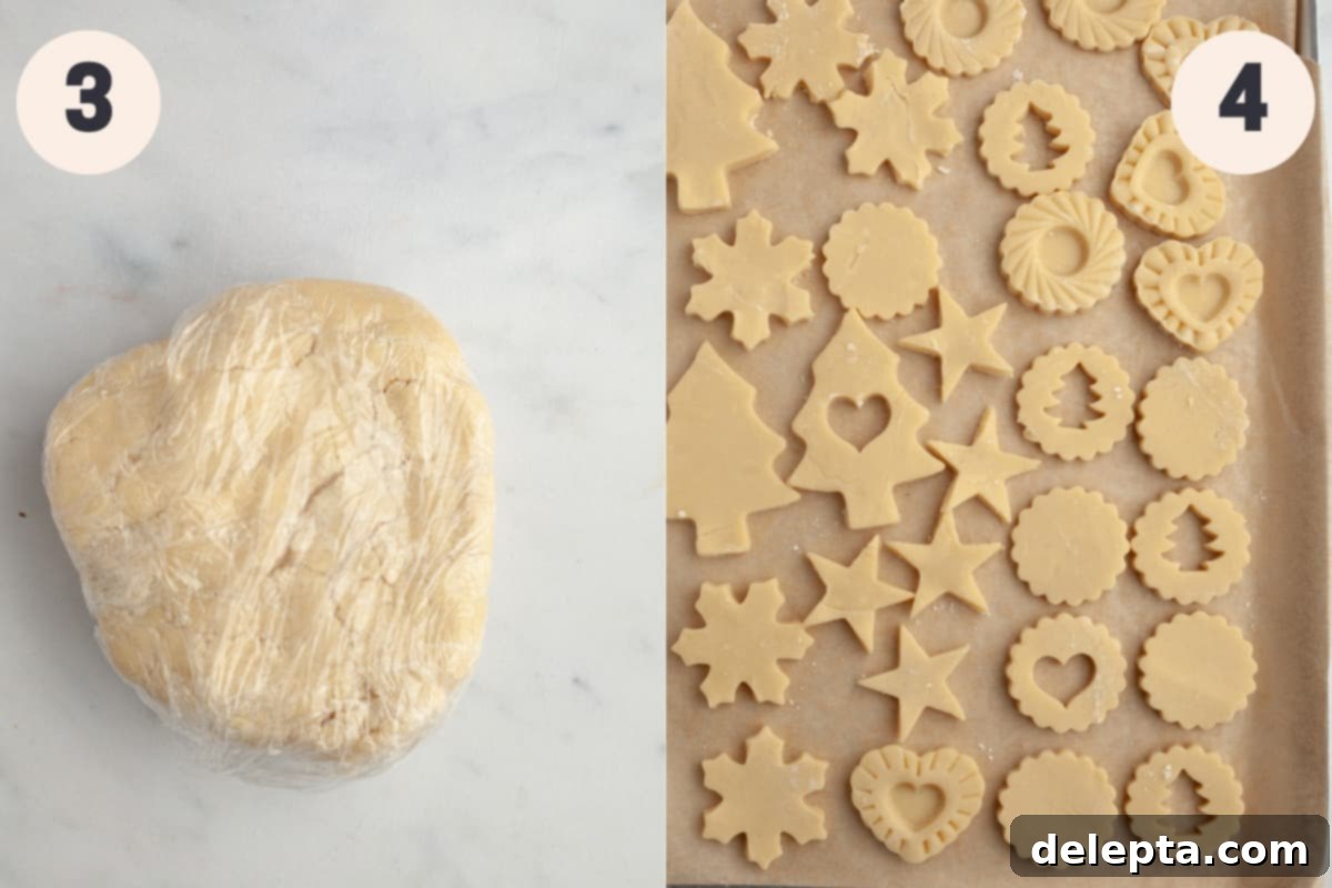 Foolproof Cutout Shortbread Cookies 5 A ball of cookie dough neatly wrapped in clingfilm, alongside several unbaked, neatly cut-out shortbread cookies arranged on a baking sheet lined with parchment paper.