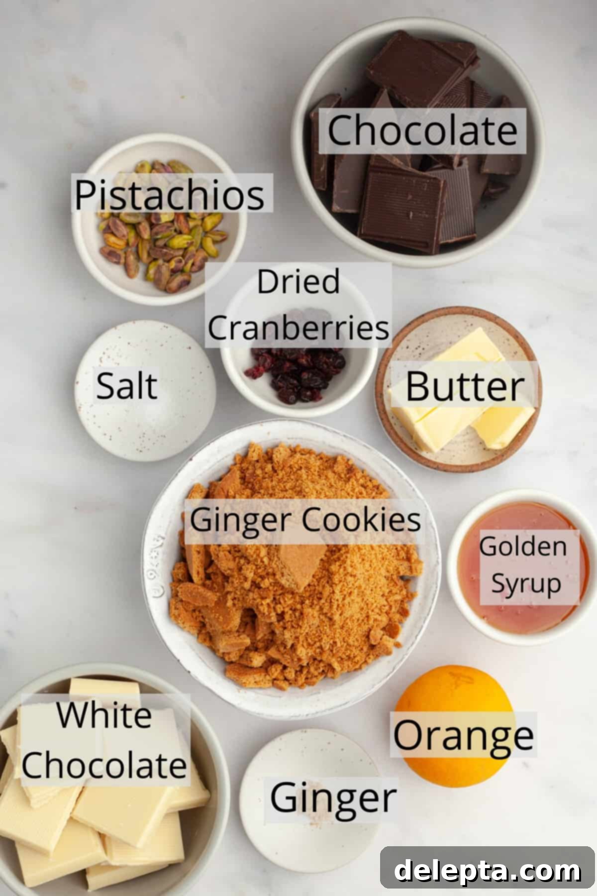 No-Bake Chocolate Biscuit Cake 3 All the ingredients needed to make chocolate tiffin bars, weighed out into small bowls.