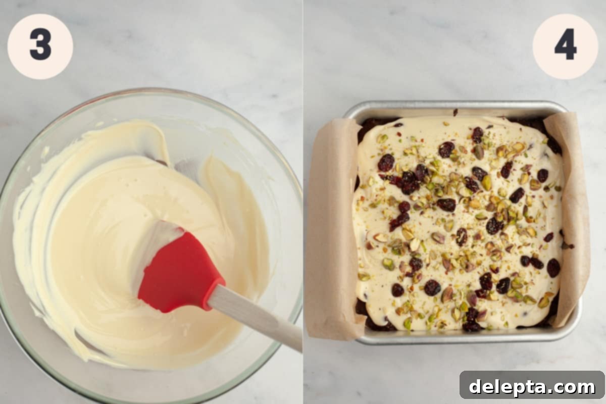 No-Bake Chocolate Biscuit Cake 5 White chocolate in a bowl and a square pan covered in white chocolate, pistachios and dried cranberries.