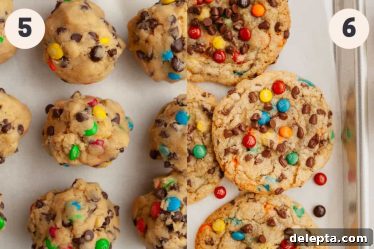 One-Bowl Rainbow Chip Cookie Delight 6 Unbaked M&M chocolate chip cookie dough balls on parchment paper and a tray of freshly baked cookies cooling.