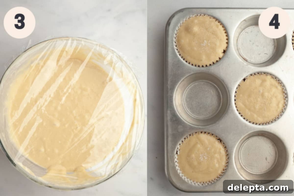 Bakery Style Moist Vanilla Muffins 5 Muffin batter resting in a glass bowl covered with plastic wrap, next to an unbaked muffin pan.