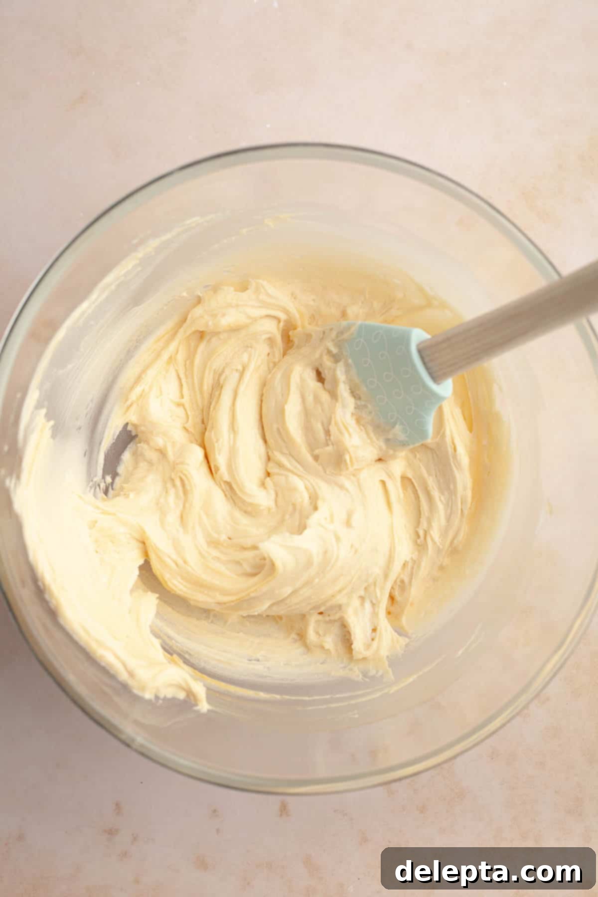 Decadent Chocolate Salted Caramel Cupcakes 9 Smooth and creamy salted caramel buttercream in a glass bowl, perfectly whipped and ready for frosting.
