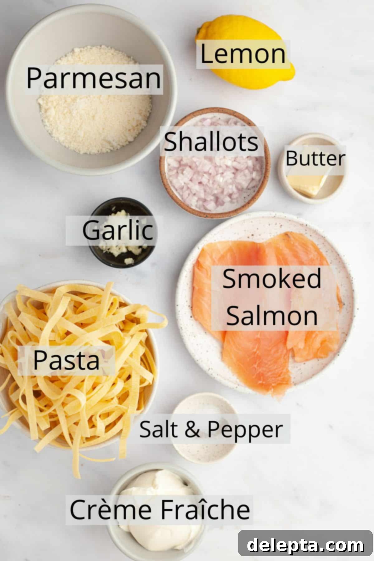 Creamy Salmon Pasta with Crème Fraîche 3 All the ingredients needed to make salmon pasta with creme fraiche weighed out into small bowls.