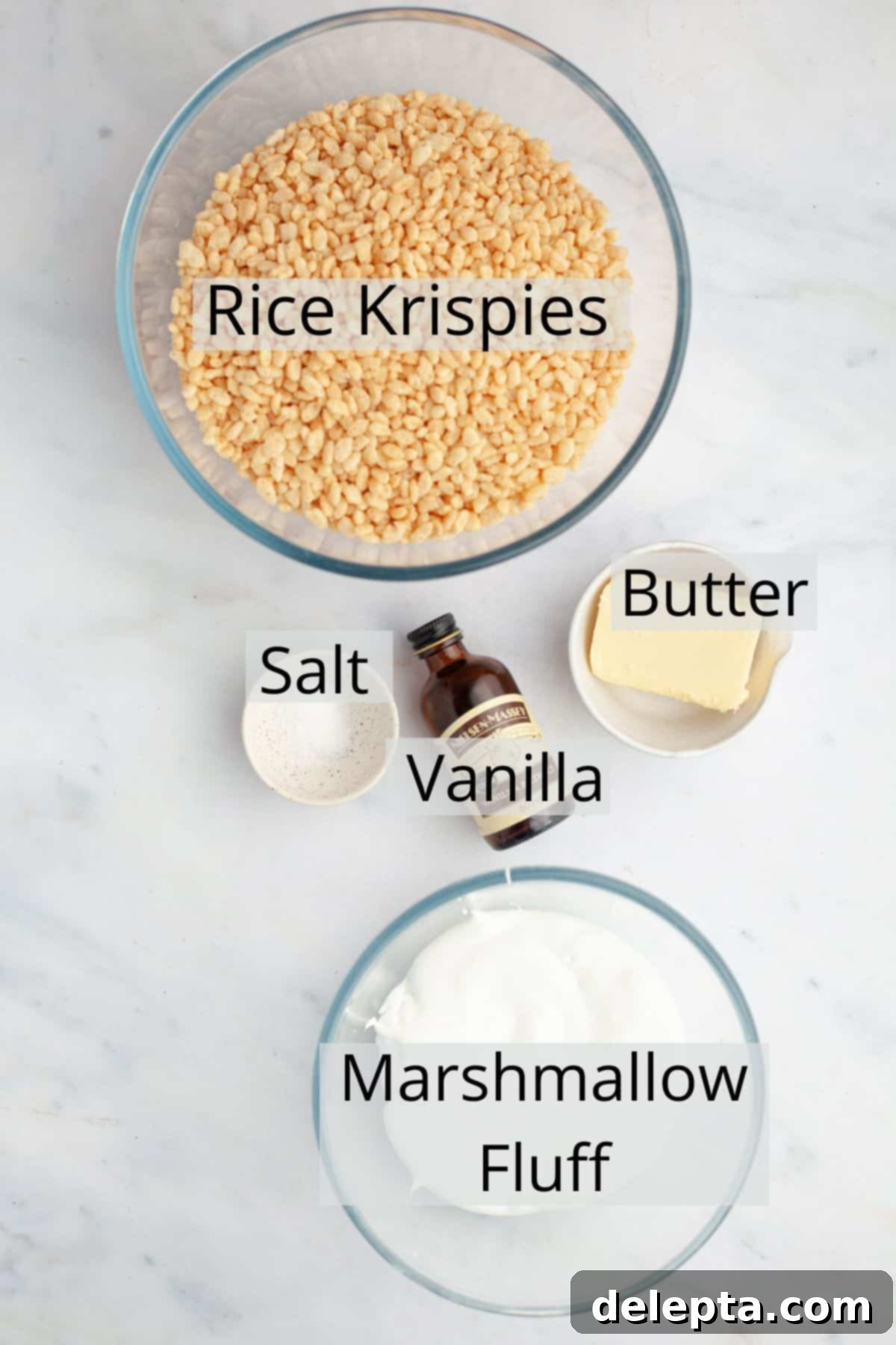 Fluffy Marshmallow Krispie Bars 3 All the ingredients needed to make rice krispie treats with marshmallow fluff weighed out into small bowls.