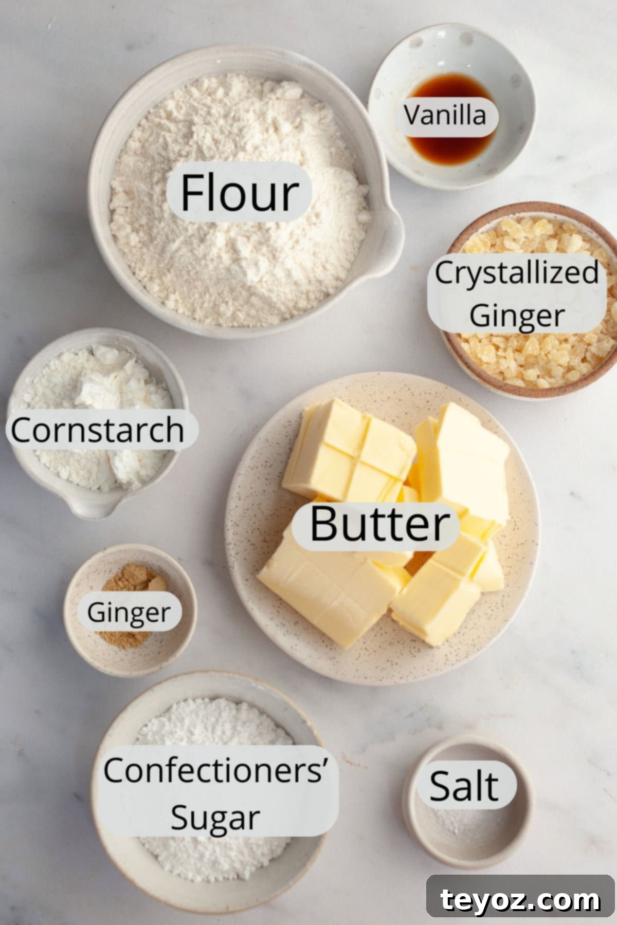 Double the Zing: Ginger Snap Delights 3 All the ingredients required for making ginger shortbread cookies, neatly weighed out into individual small bowls.