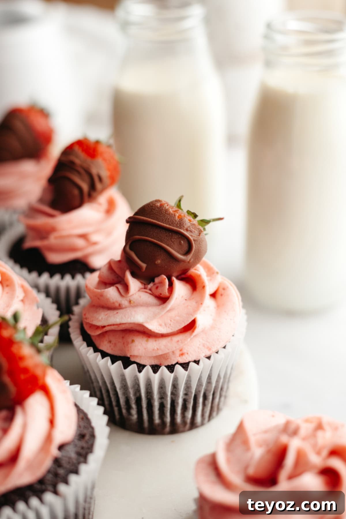 Strawberry frosted chocolate cupcakes